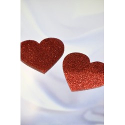 Paire de cache tétons adhésifs coeur pailleté rouge 